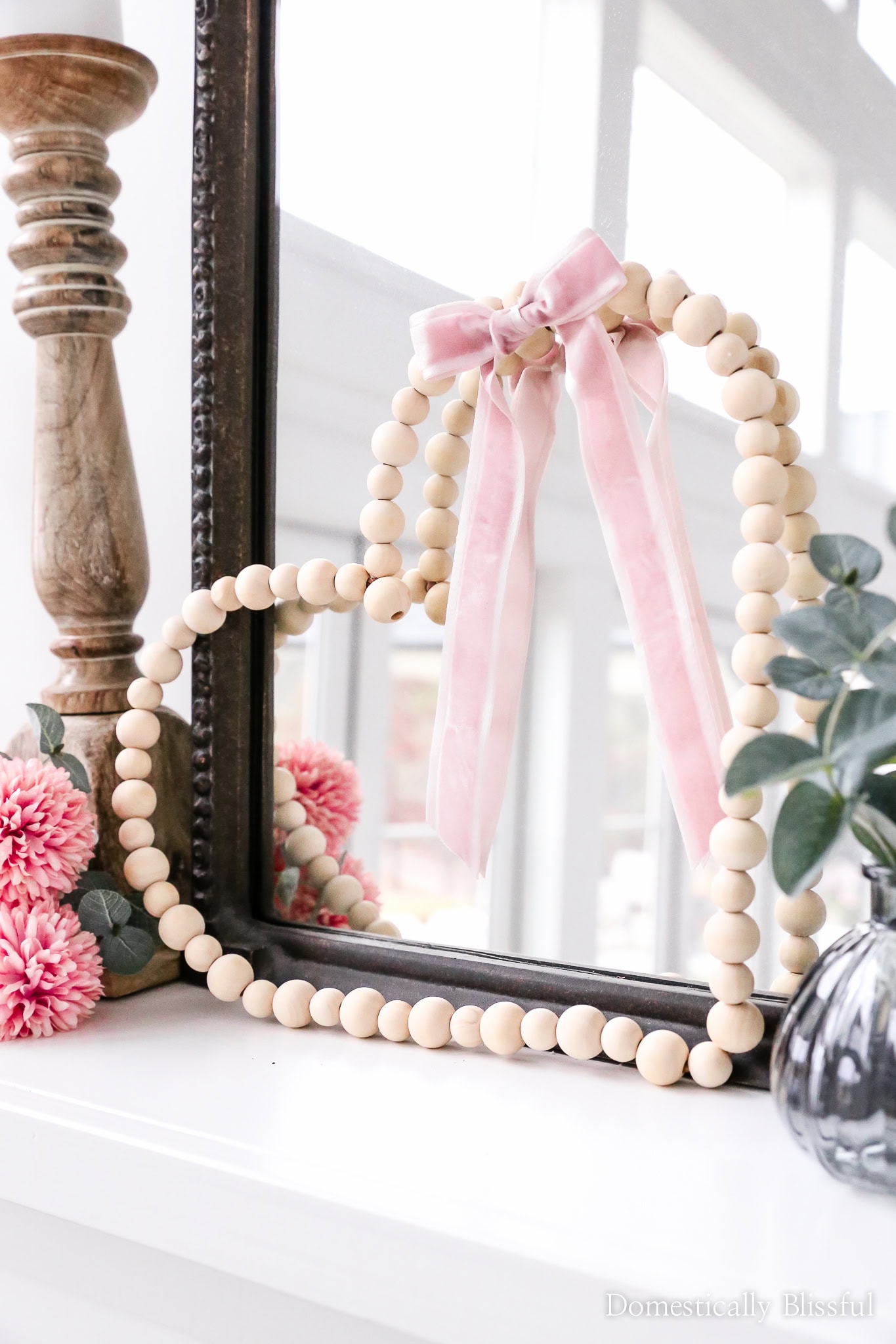 DIY Valentine's Day Decor idea featuring heart-shaped wreath