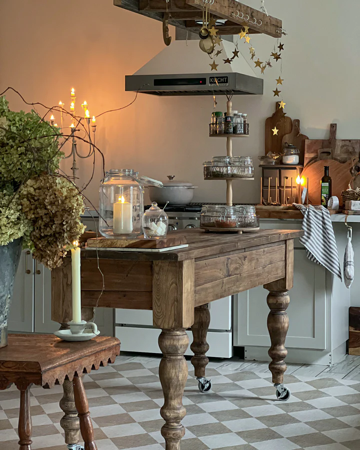 Example of French kitchen style decor featuring a kitchen with rustic touches