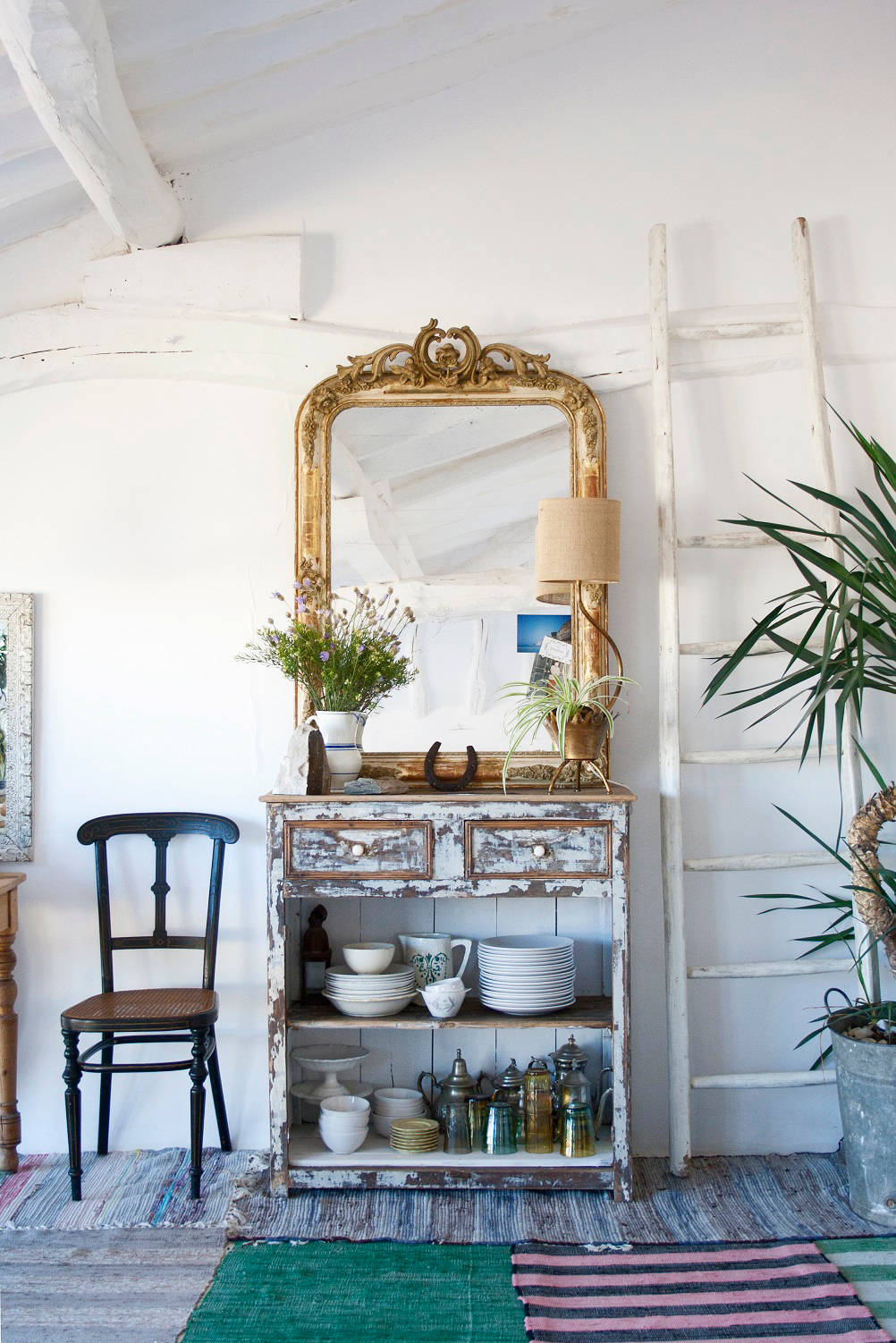 Vintage style furniture example of eclectic coastal living room