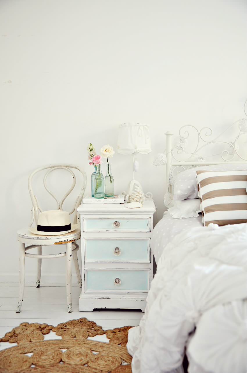 Vintage style furniture example of eclectic coastal cottage bedroom