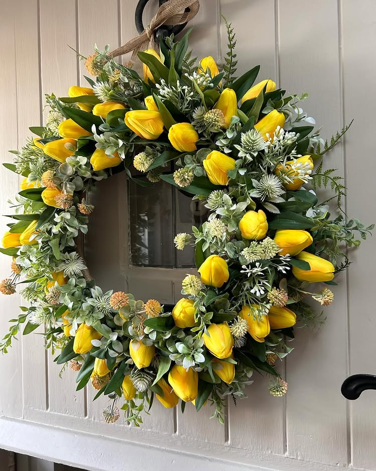 spring wreath for your front door idea featuring yellow tulips