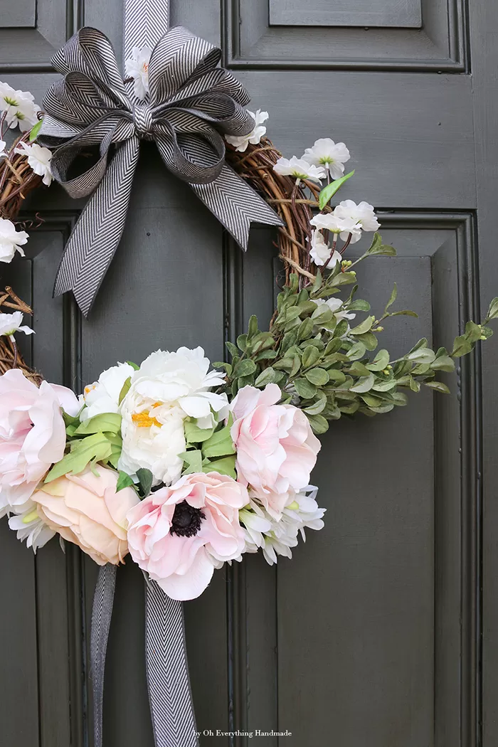 spring wreath for your front door idea featuring a minimalist hoop wreath