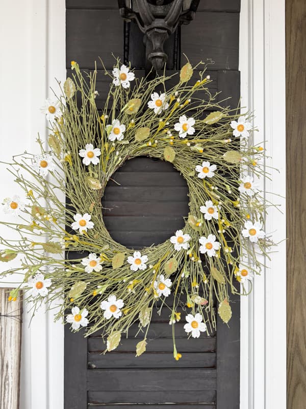 spring wreath for your front door idea featuring wildflower daisies in farmhouse style