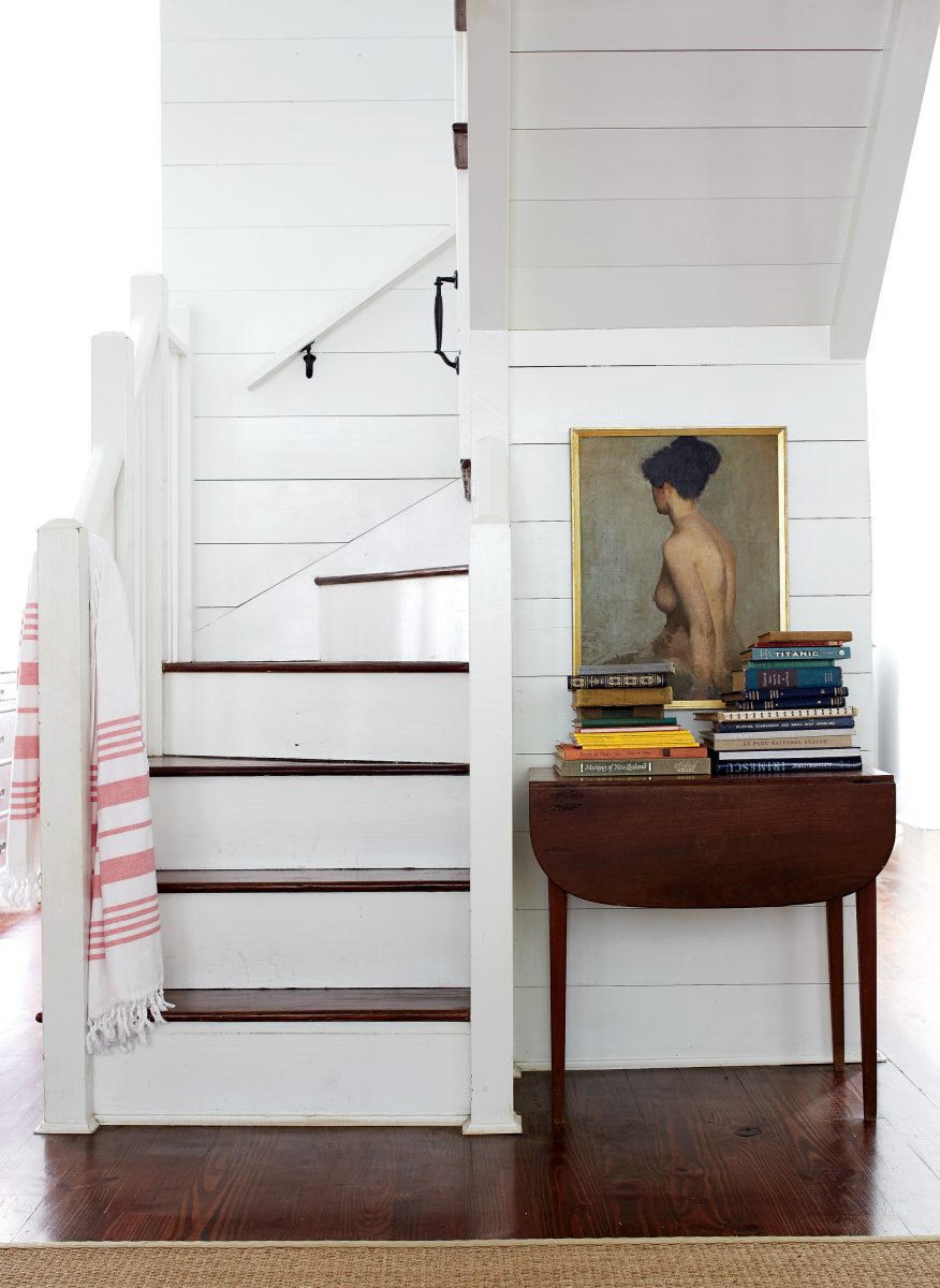 Brunette flooring example featuring a contemporary traditional stairs corner