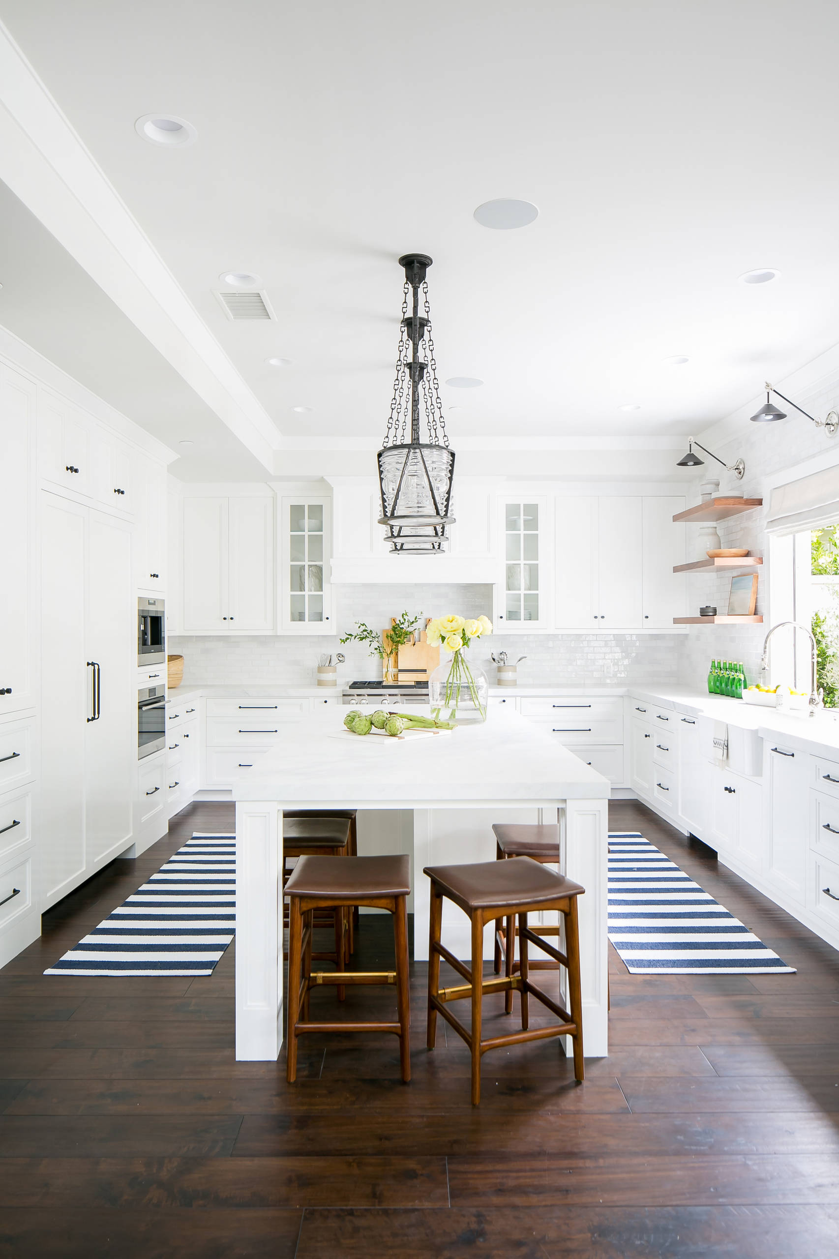Brunette flooring example featuring a contemporary coastal kitchen