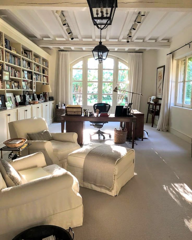 Nancy Meyers interiors inspiration example showcasing a traditional living room with comforting layered decor