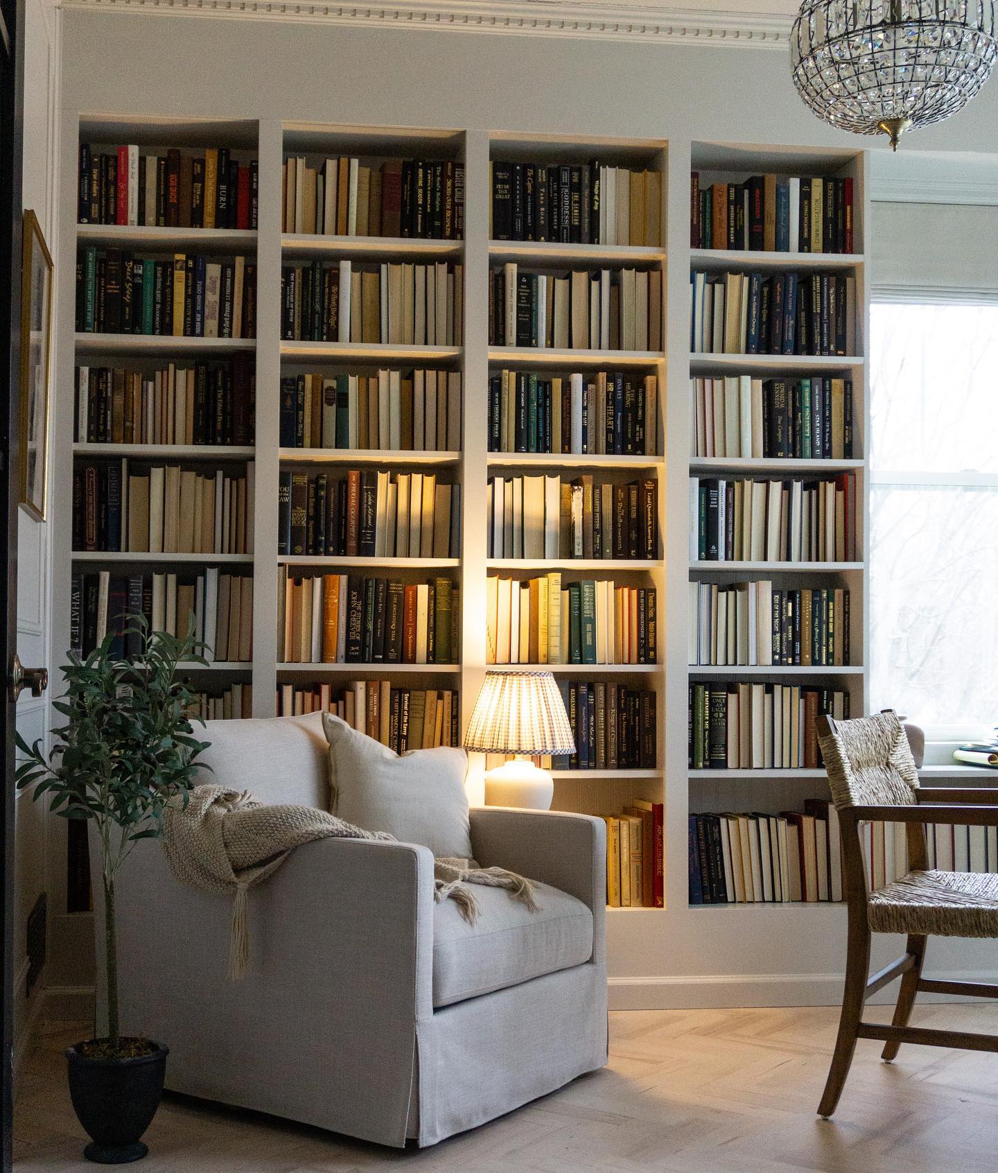 Nancy Meyers interiors inspiration example showcasing a traditional reading nook with comforting layered decor