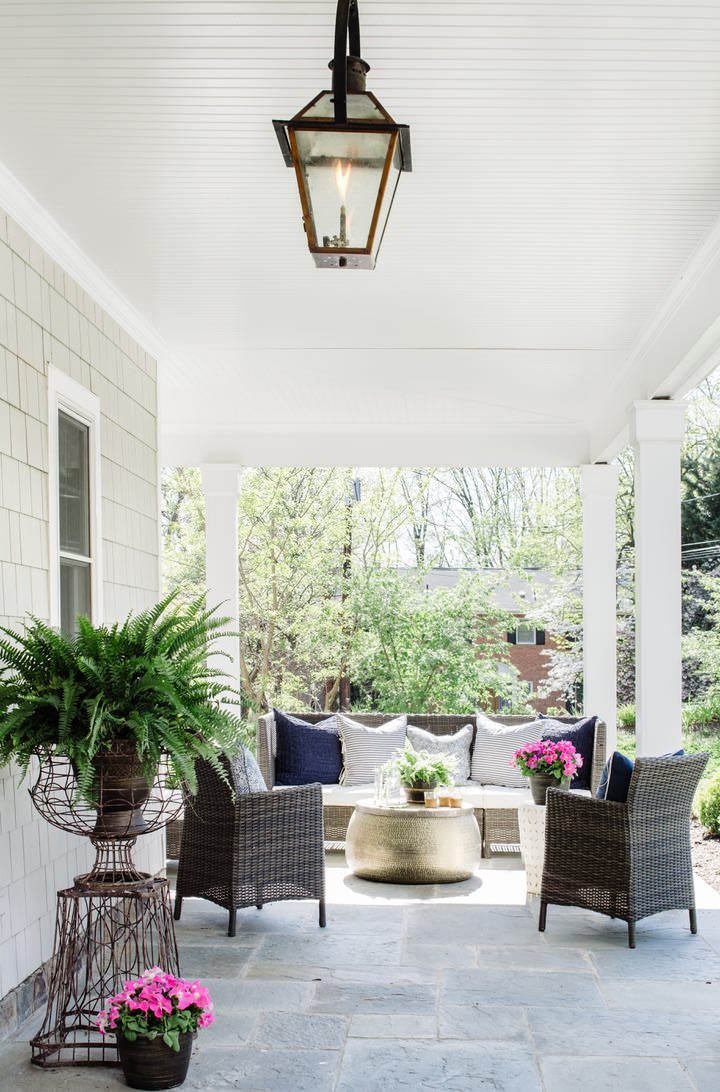 Spring front porch ideas featuring a traditional airy style example