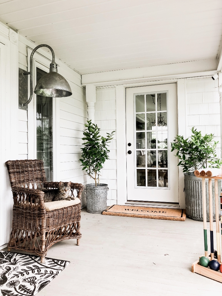 Spring front porch ideas featuring a farmhouse style example