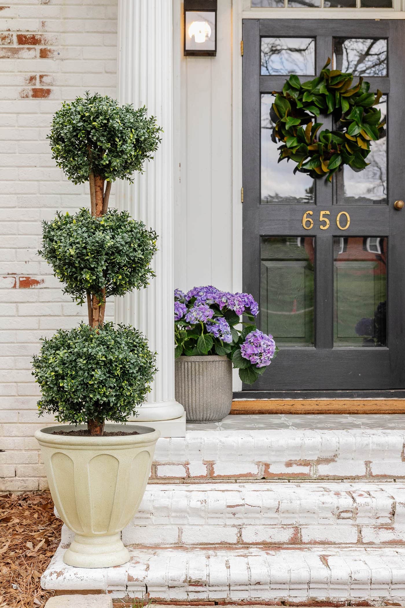 Spring front porch ideas featuring a traditional style example