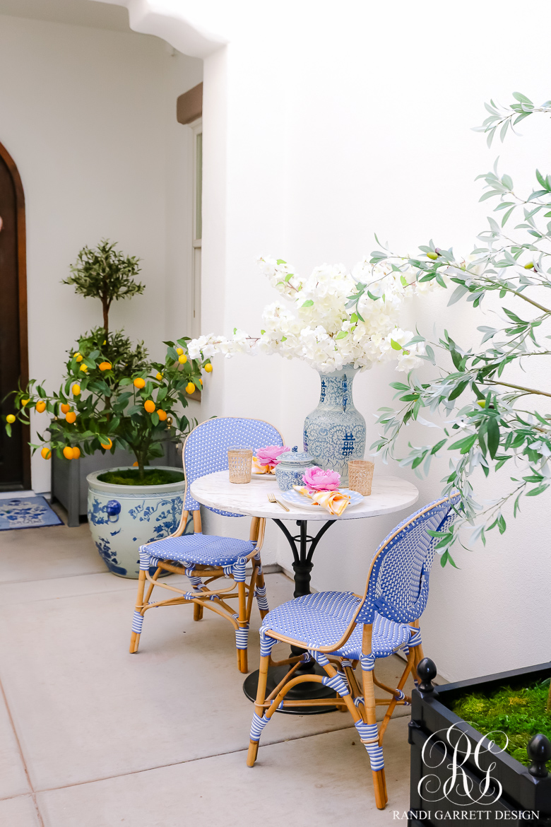 Spring front porch ideas featuring a traditional coastal bistro style example