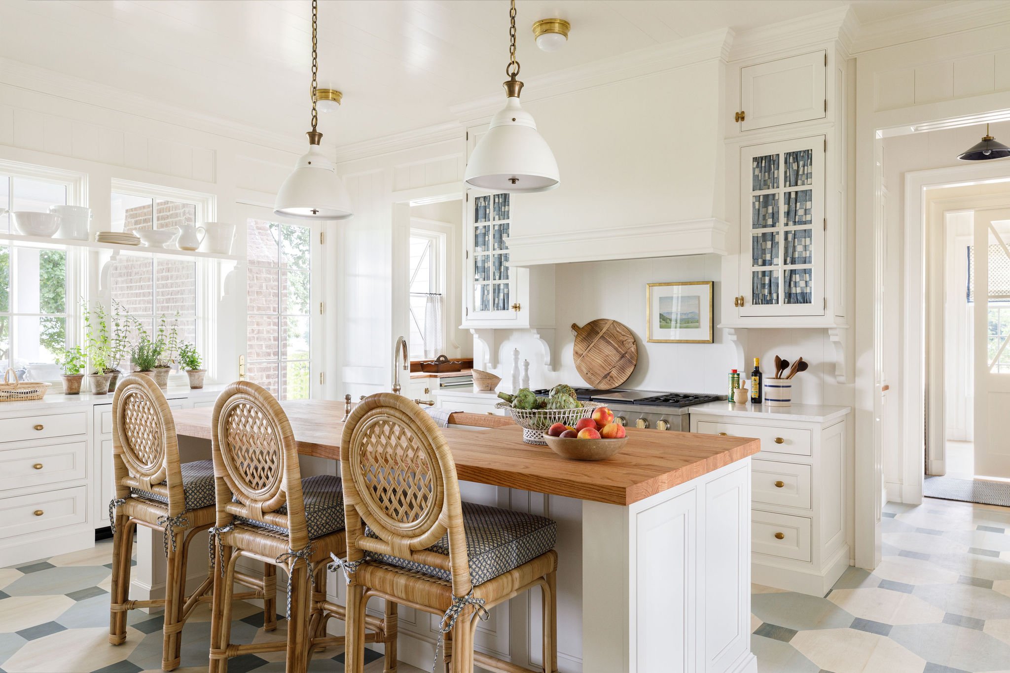Coastal grandmother aesthetic vs Nancy Meyers interior design styles, example showcasing kitchen room.