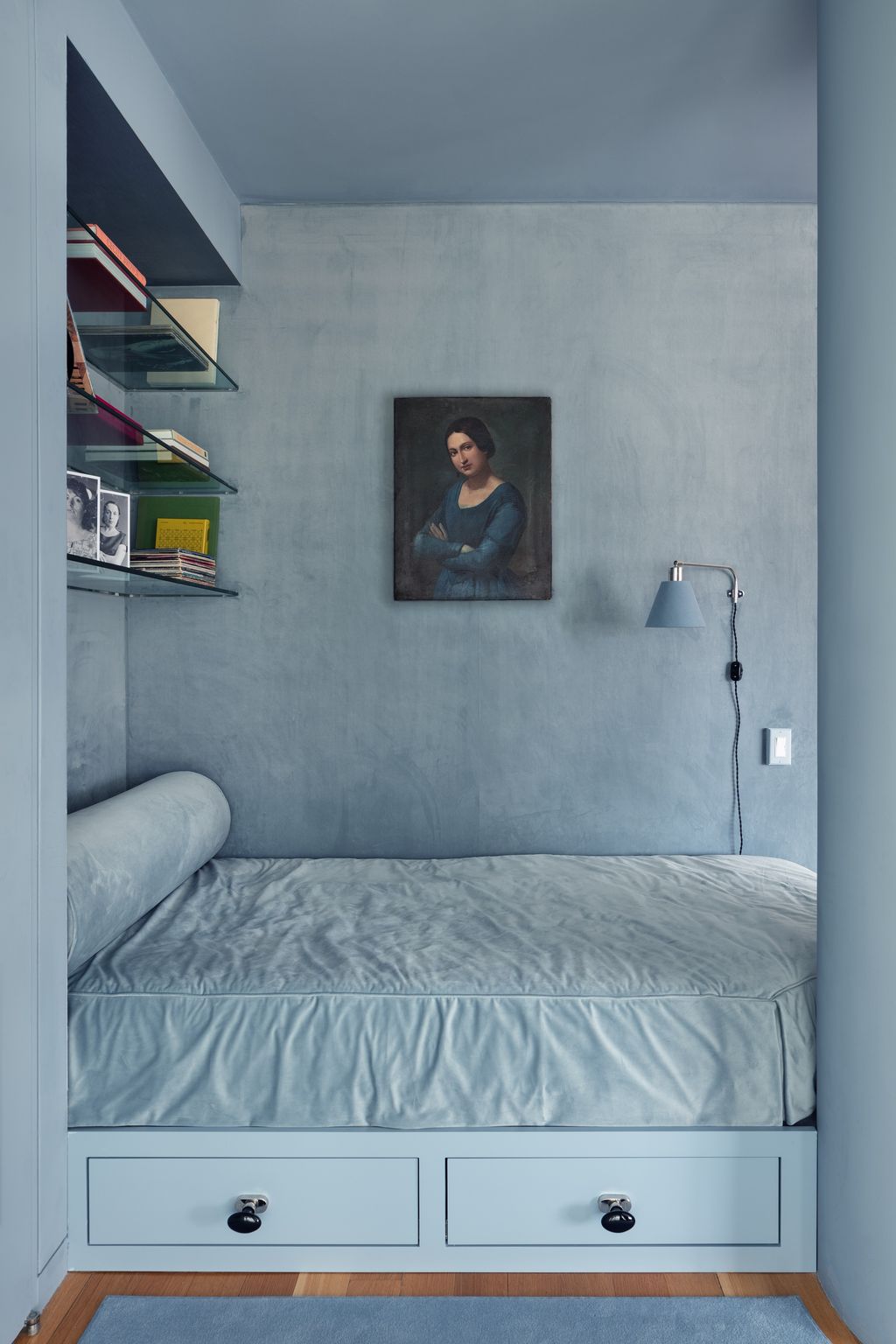 Color drenching idea showing a sleeping nook in a dusty mid blue