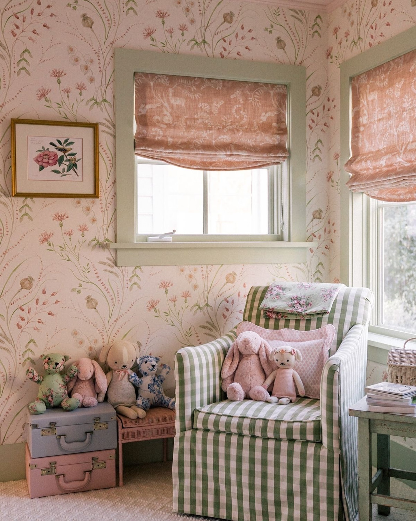 Vintage inspired nursery example featuring a traditional style in pink and sage green color scheme