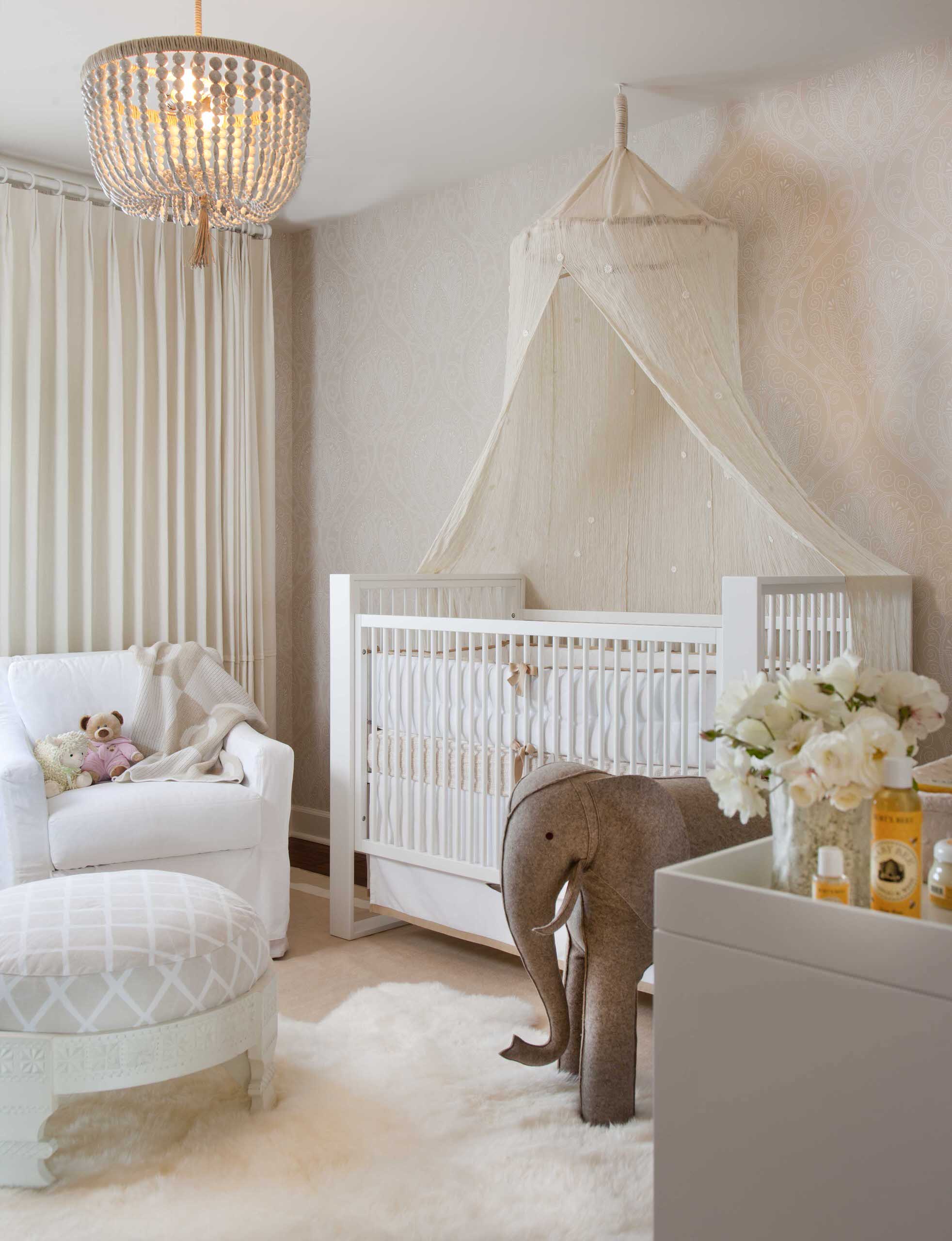 Vintage inspired nursery example featuring a traditional style in neutral color scheme with safari vintage theme