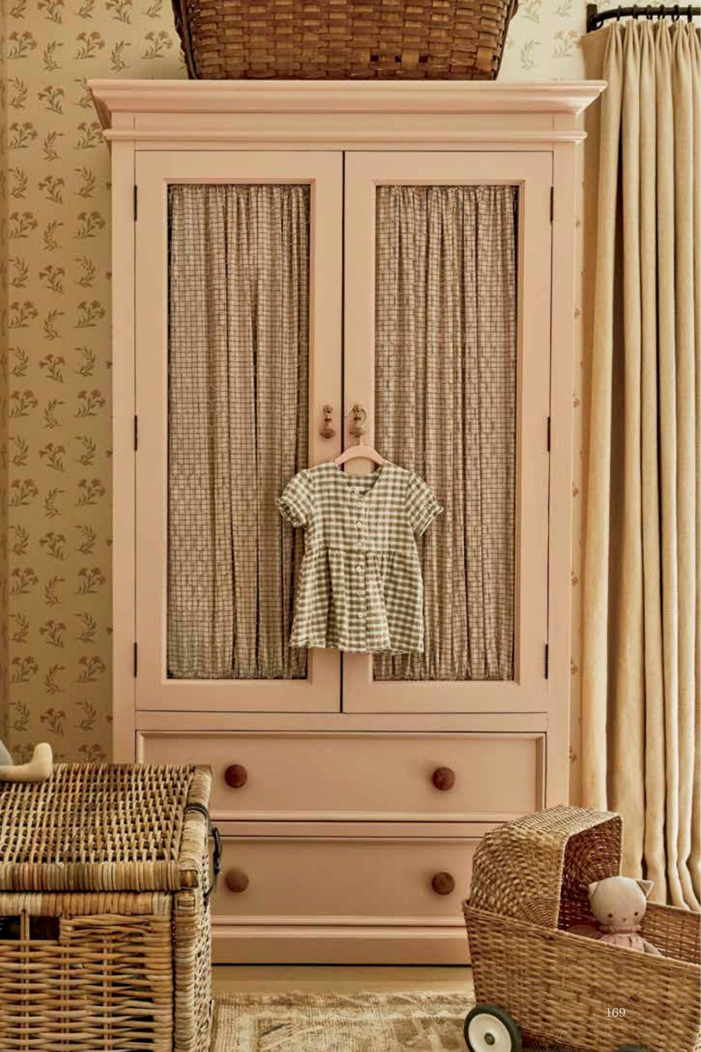 Vintage inspired nursery example featuring a traditional style in pink colors