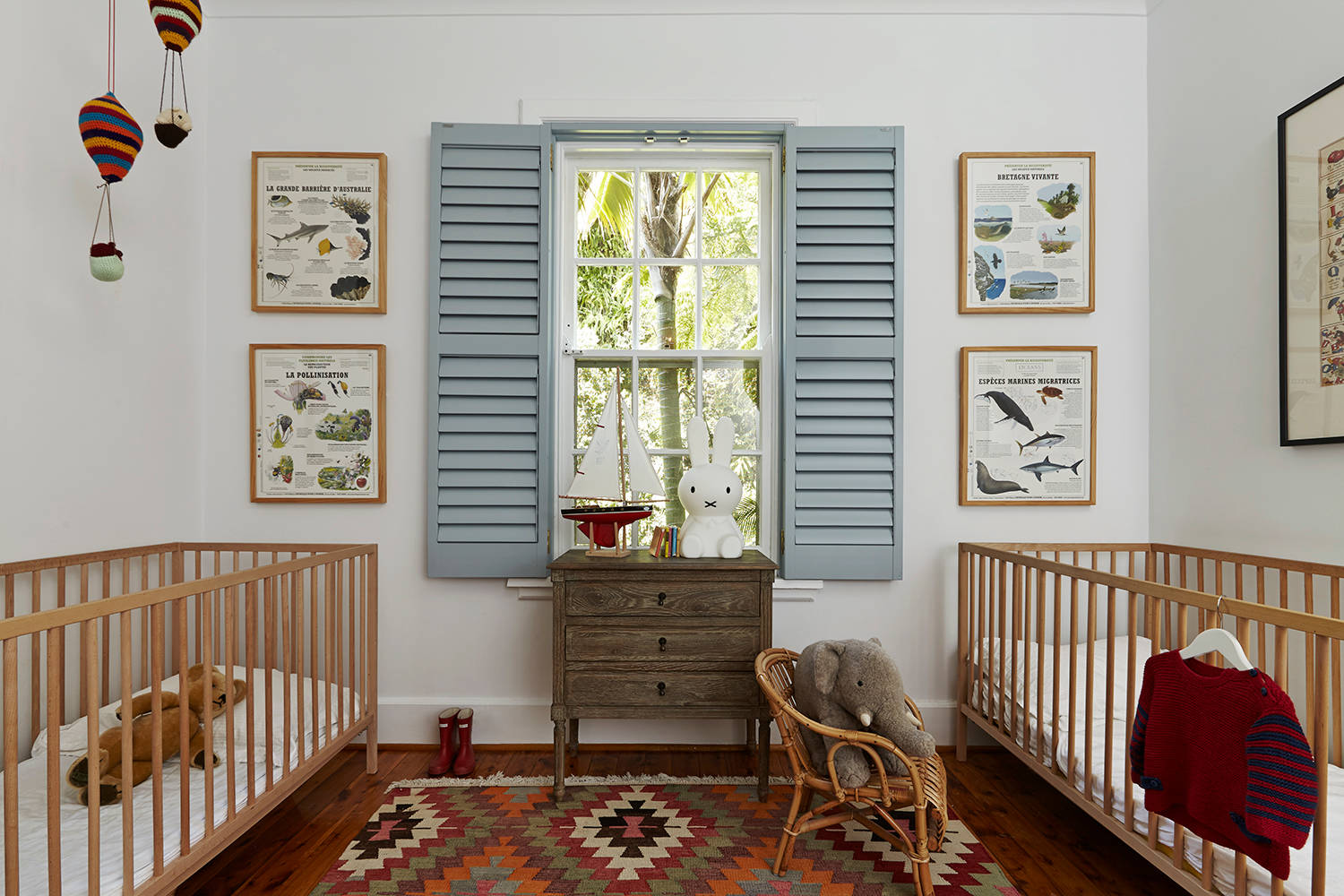 Vintage inspired nursery example featuring a traditional style in neutral color scheme with safari vintage theme