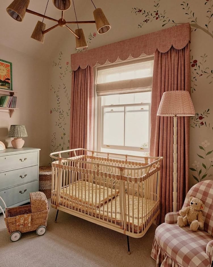 Vintage inspired nursery example featuring a traditional style in pink and amber color scheme