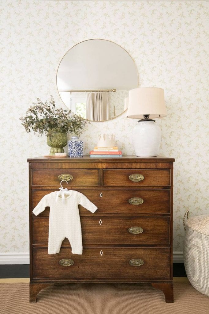 Vintage inspired nursery example featuring a traditional style in neutral color scheme
