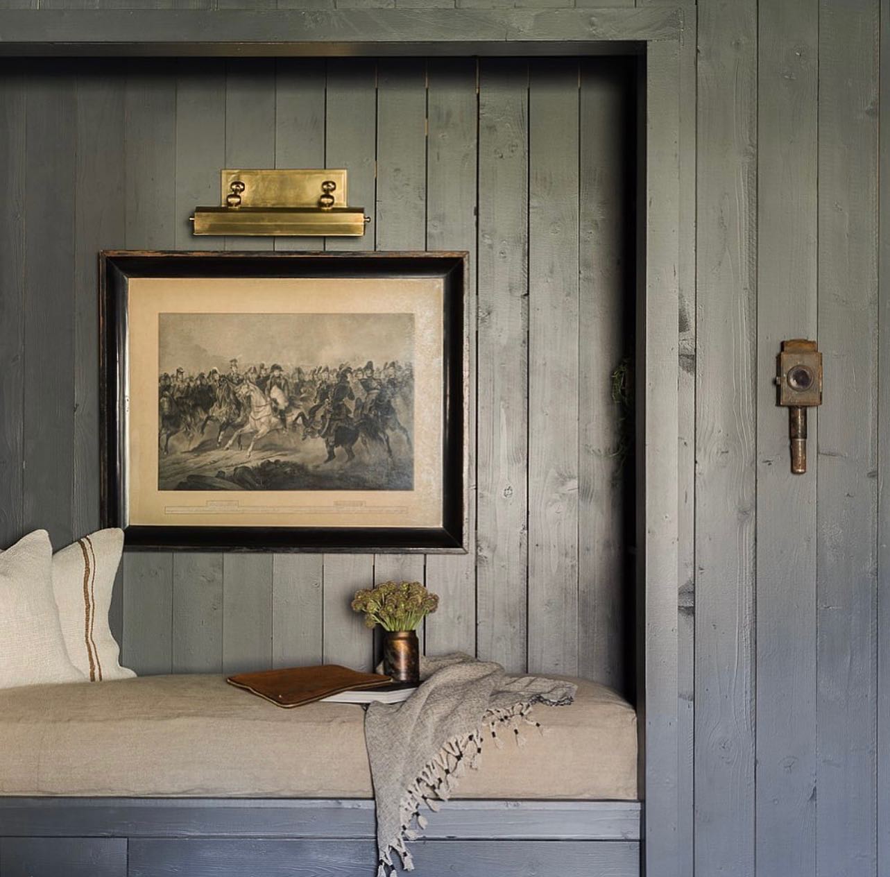 Color drenching idea showing a mudroom in a muted light blue