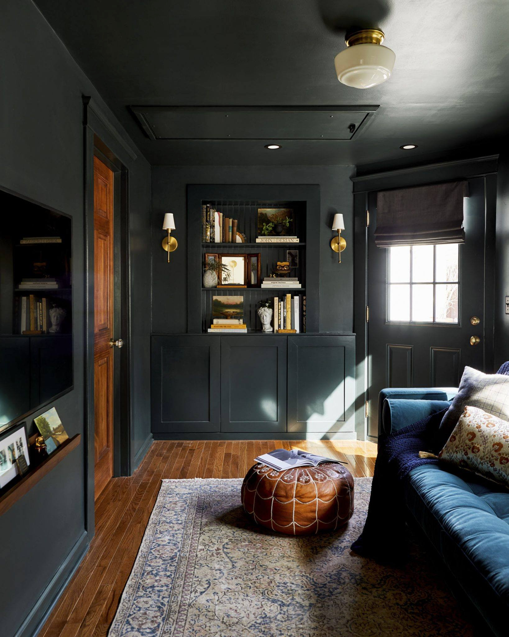 Color drenching idea showing a home office in navy blue