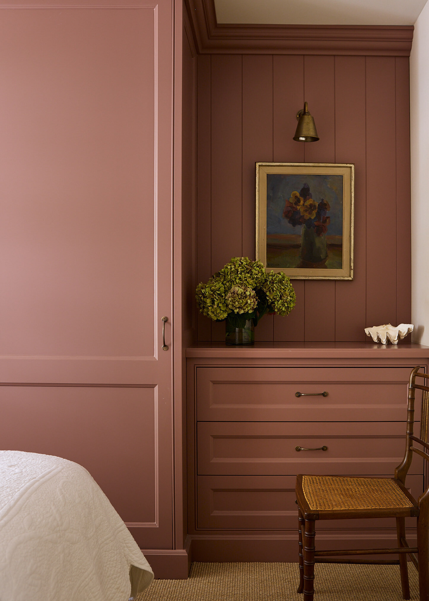Color drenching idea showing a bedroom in a pale dusty pink mauve