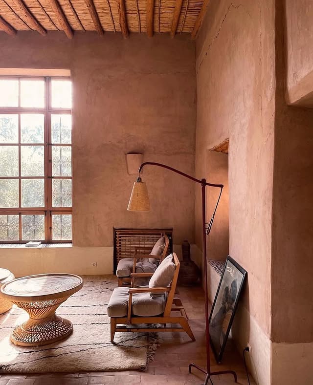 Textured wall treatments ideas showcasing an example in earthy matte pink plaster