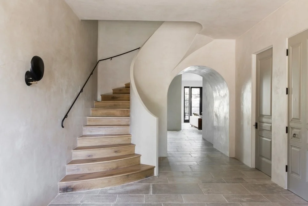 Textured wall treatments ideas showcasing an example in white plaster