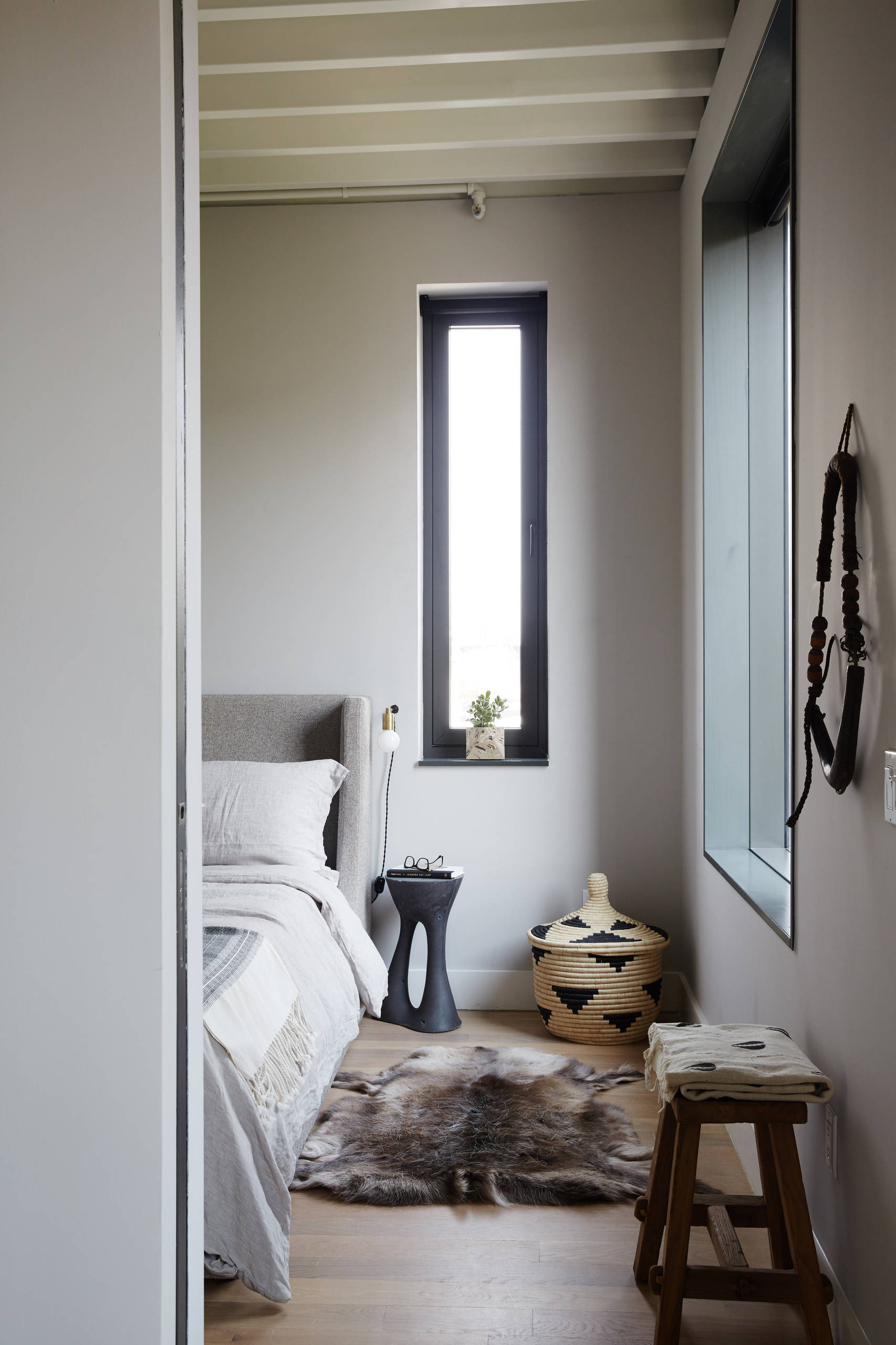 Neutral bedroom ideas in Japandi contemporary style featuring white and dark grey with black color scheme