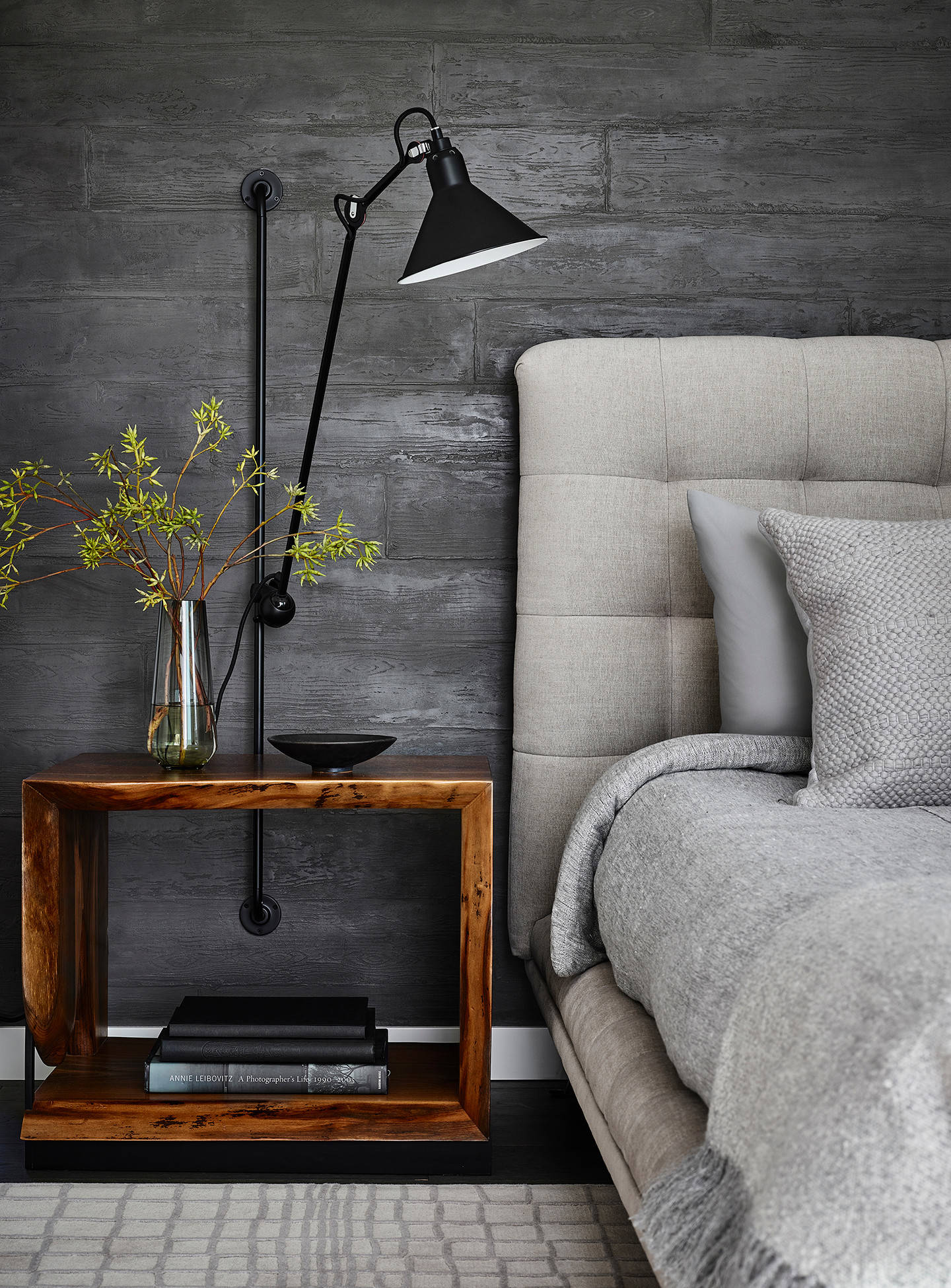 Industrial-inspired neutral bedroom in cool color palette