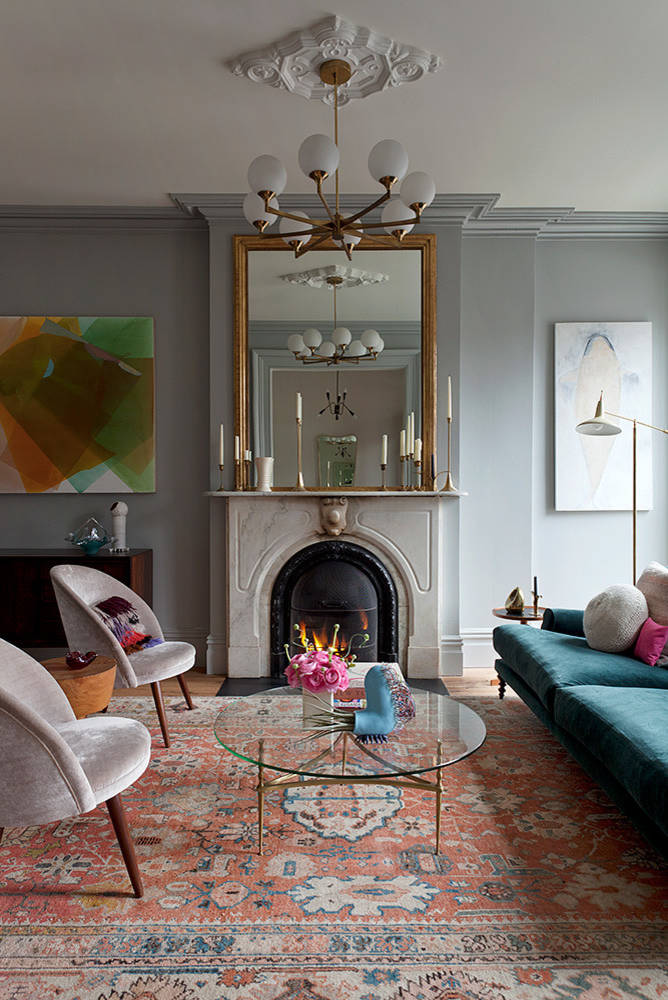 Example of transitional mantel decor style featuring a contemporary look