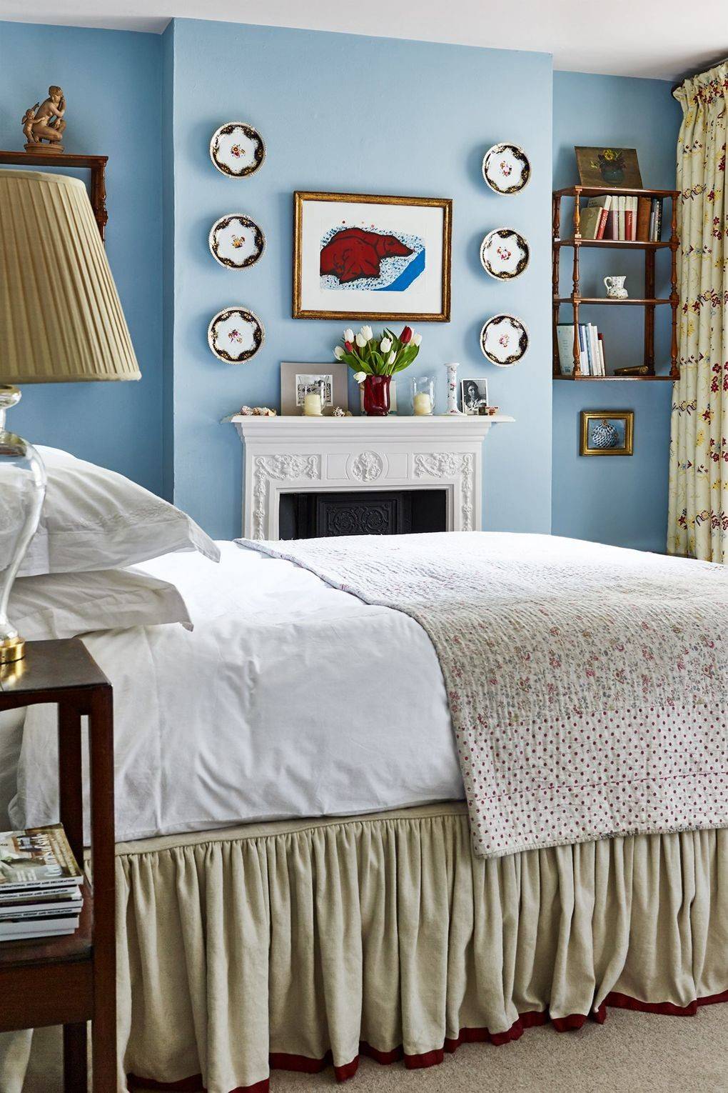 Example of transitional mantel decor style featuring a modern cottage look