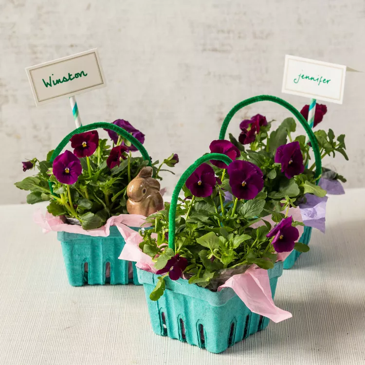 Last-minute Easter basket ideas featuring a recycled basket with flowers for adults.