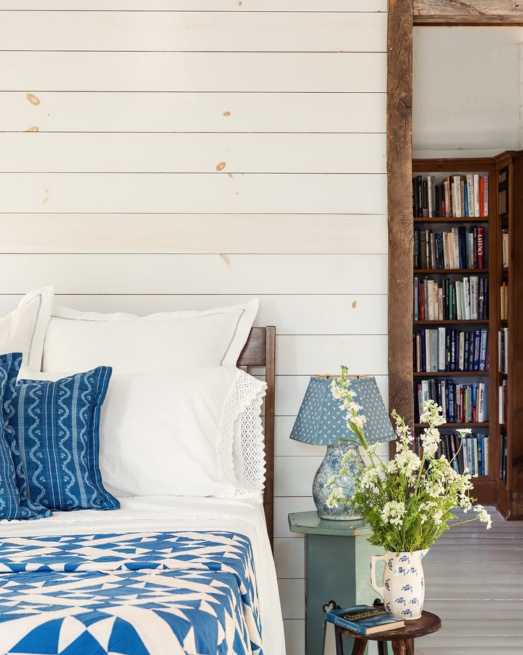 Bedroom design example of modern coastal bedroom in neutral blue color palette