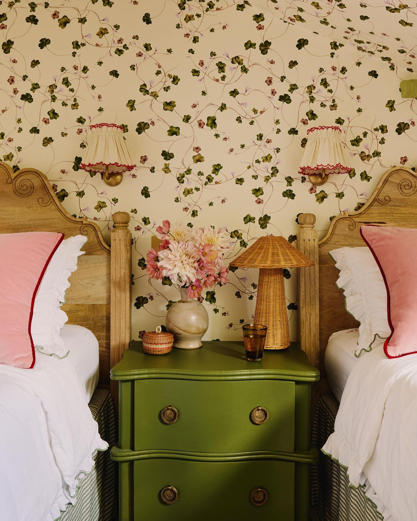 Example of twin cottagecore bedroom ideas featuring whimsy style with floral wallpaper in pink and green