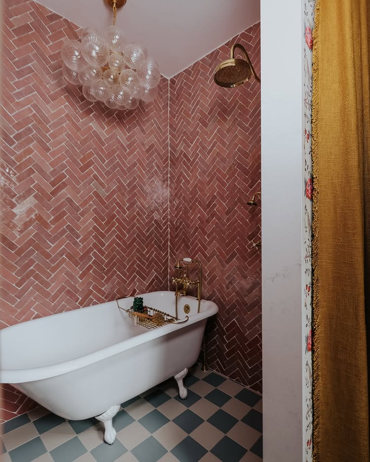 Jack and Jill bathroom example showcasing a whimsical girls bathroom in dust pink and dark yellow color scheme