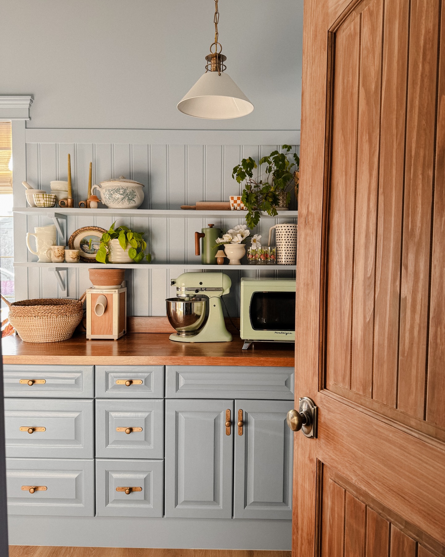 Image features a butler’s pantry in a modern cottage style
