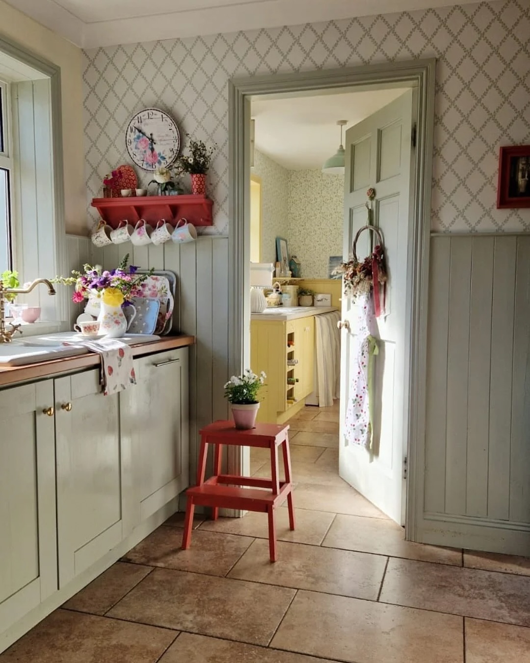 photo featuring traditional cabin kitchen cottage core with colorful details