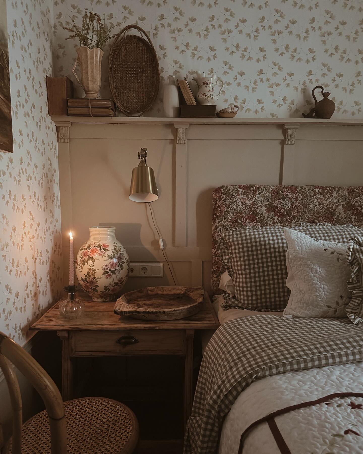 Example of cottagecore bedroom ideas featuring cozy style with floral wallpaper in white and dusty pink