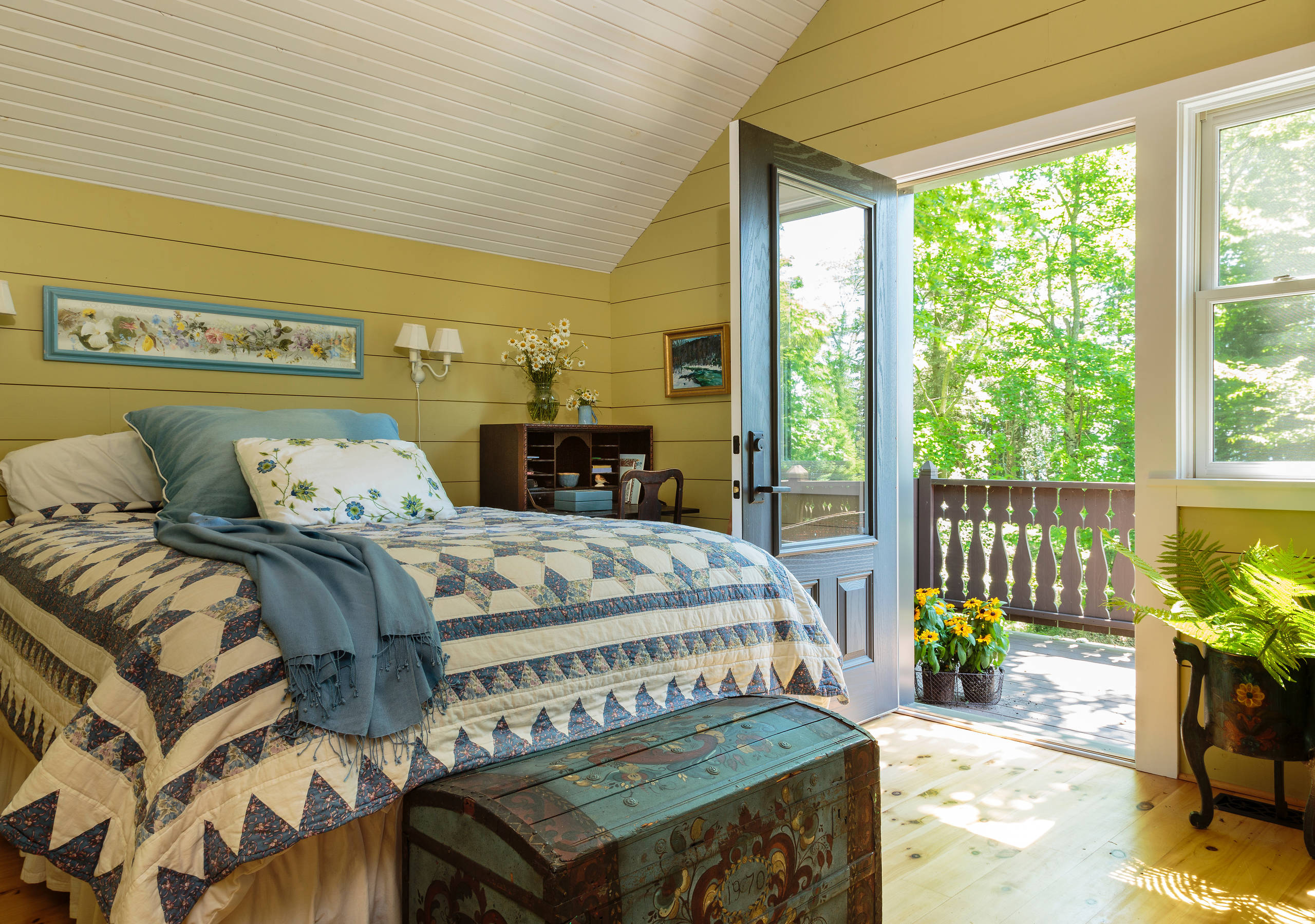 photo featuring cabin cottage core bedroom in white and blue