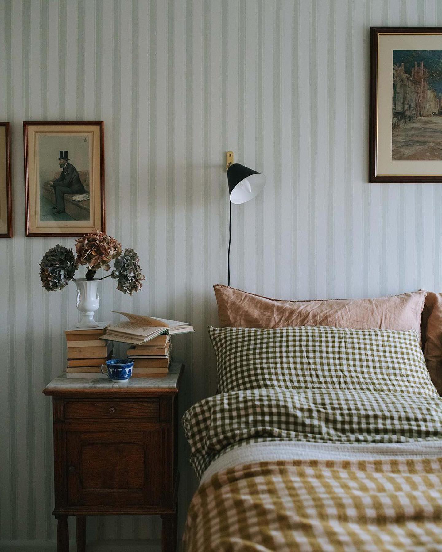 Example of cottagecore bedroom ideas featuring traditional style with striped wallpaper