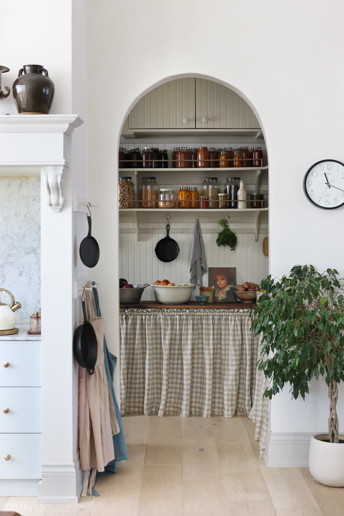 Image features a butler’s pantry in a modern cottage style
