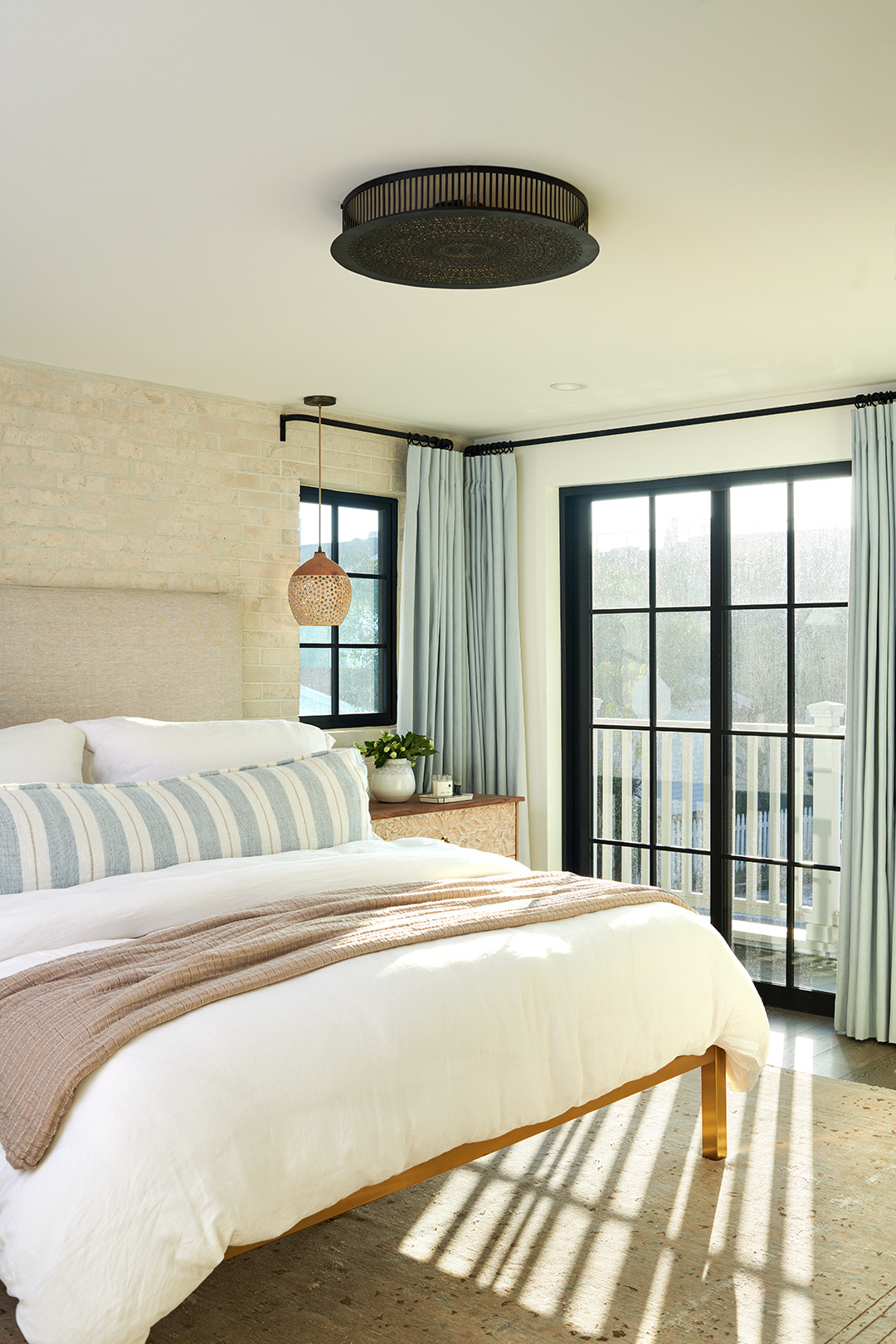 airy bedroom in coastal chic brownstone