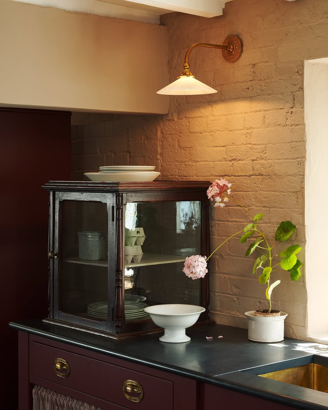 Example of lighting tips showcasing kitchen to elevate any space