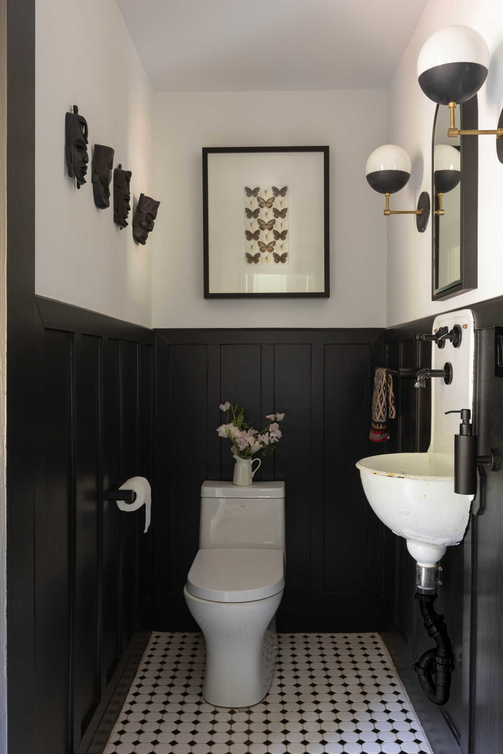 Bathroom room featuring modern farmhouse decor with dark moody color palette in Creekside Mountain home tour