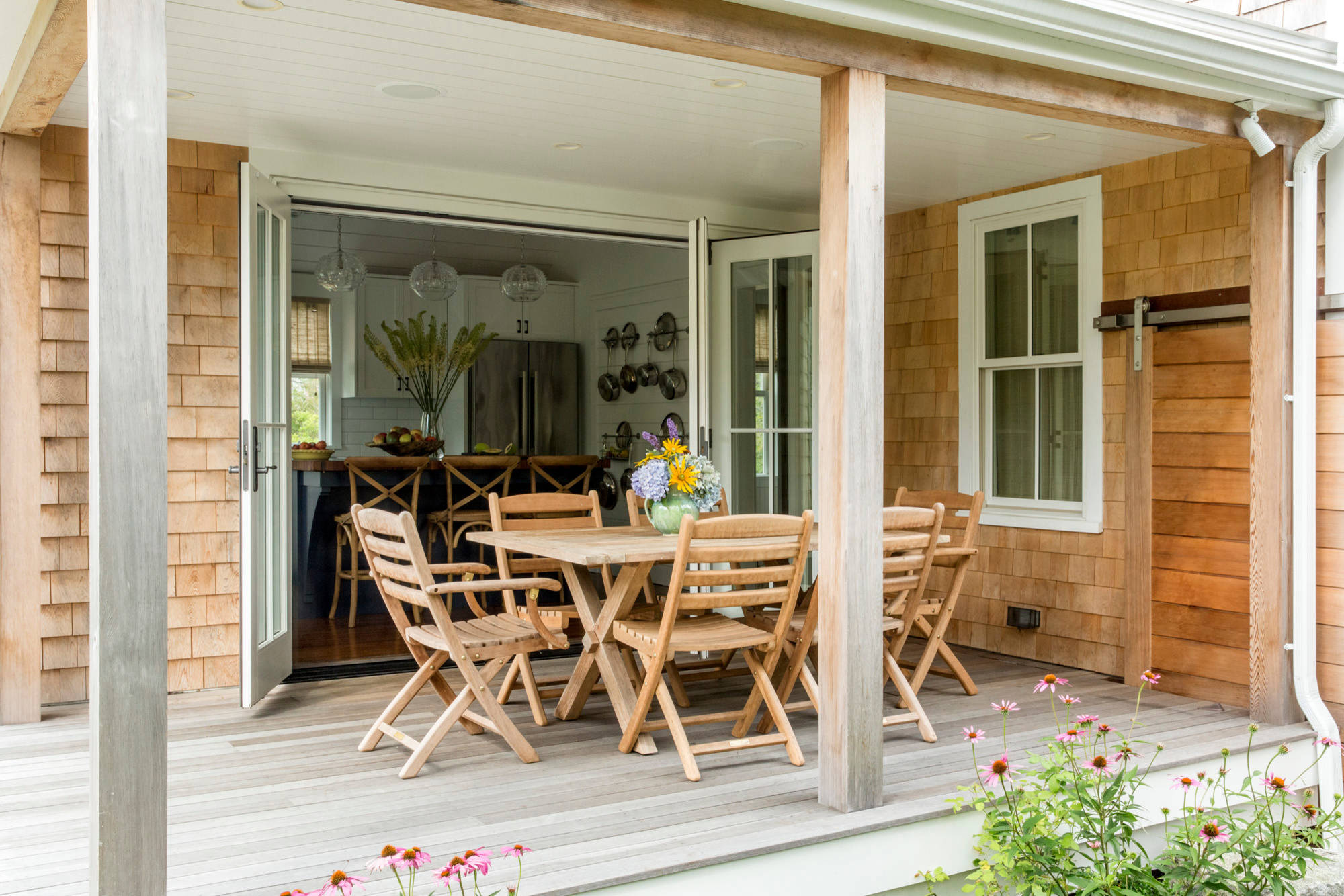 cottage home decor example of coastal home tour featuring covered porch