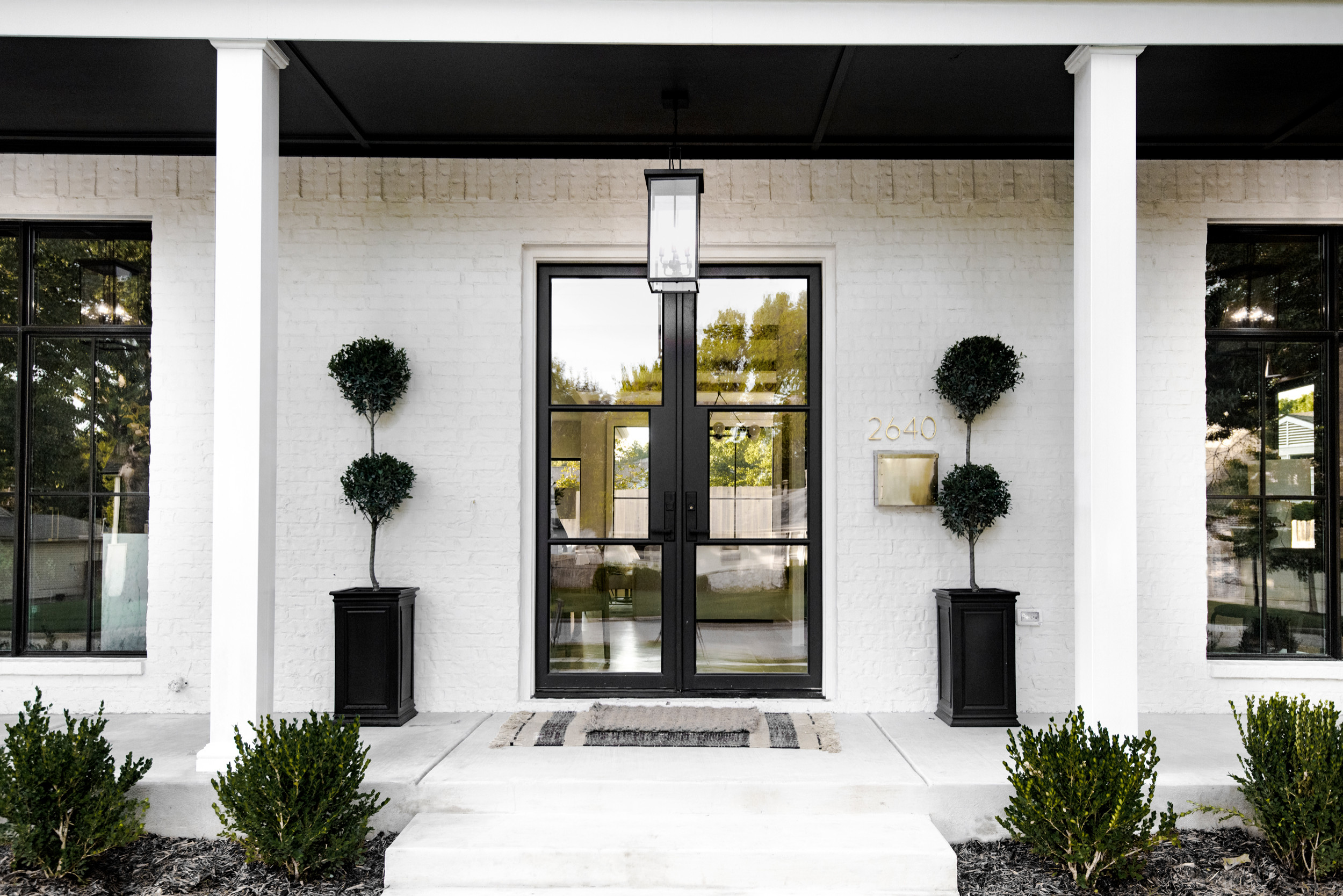 Home tour featuring outdoor porch with modern european home decor
