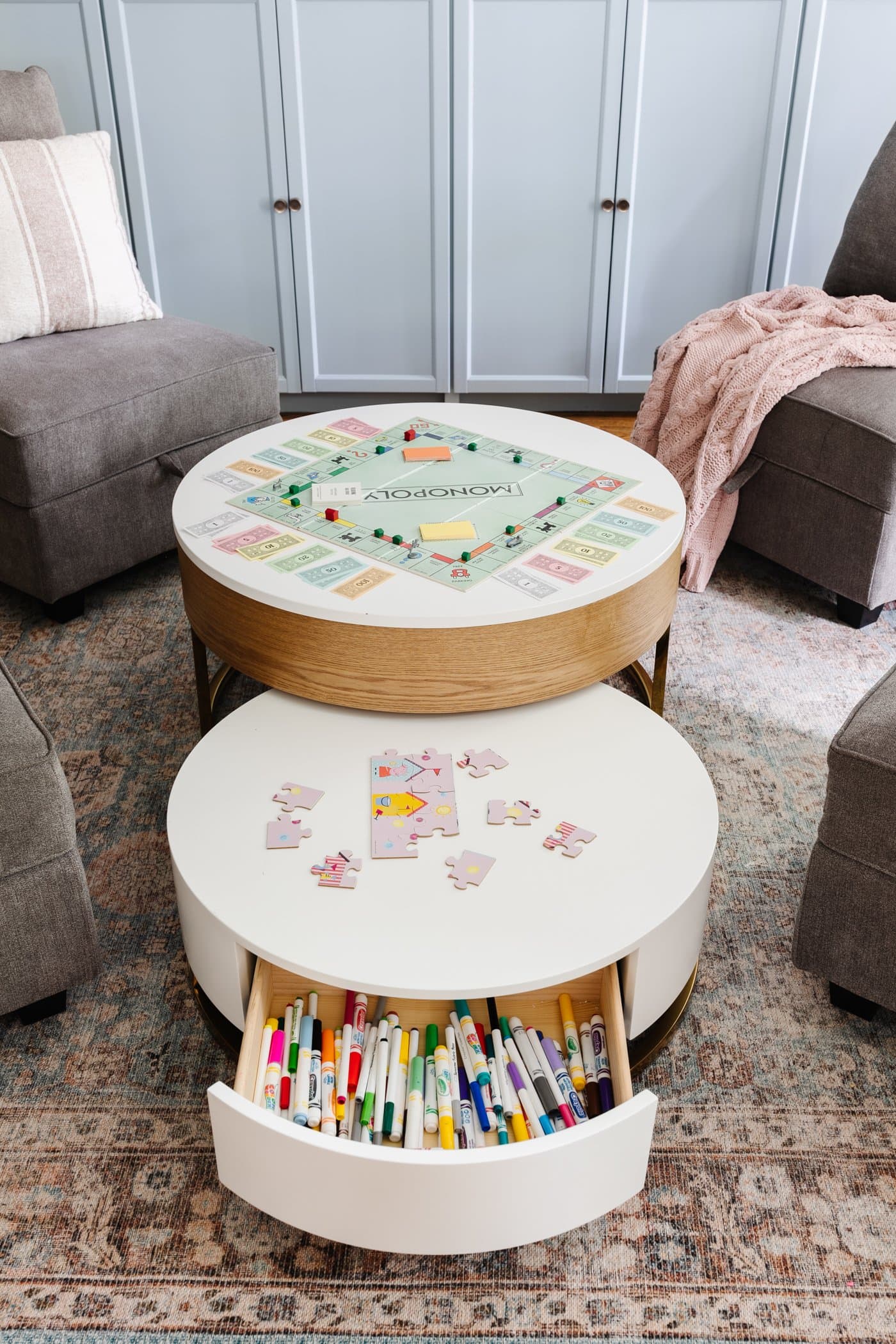 Modern minimalist decor family home featuring ottoman with hidden storage for kids games