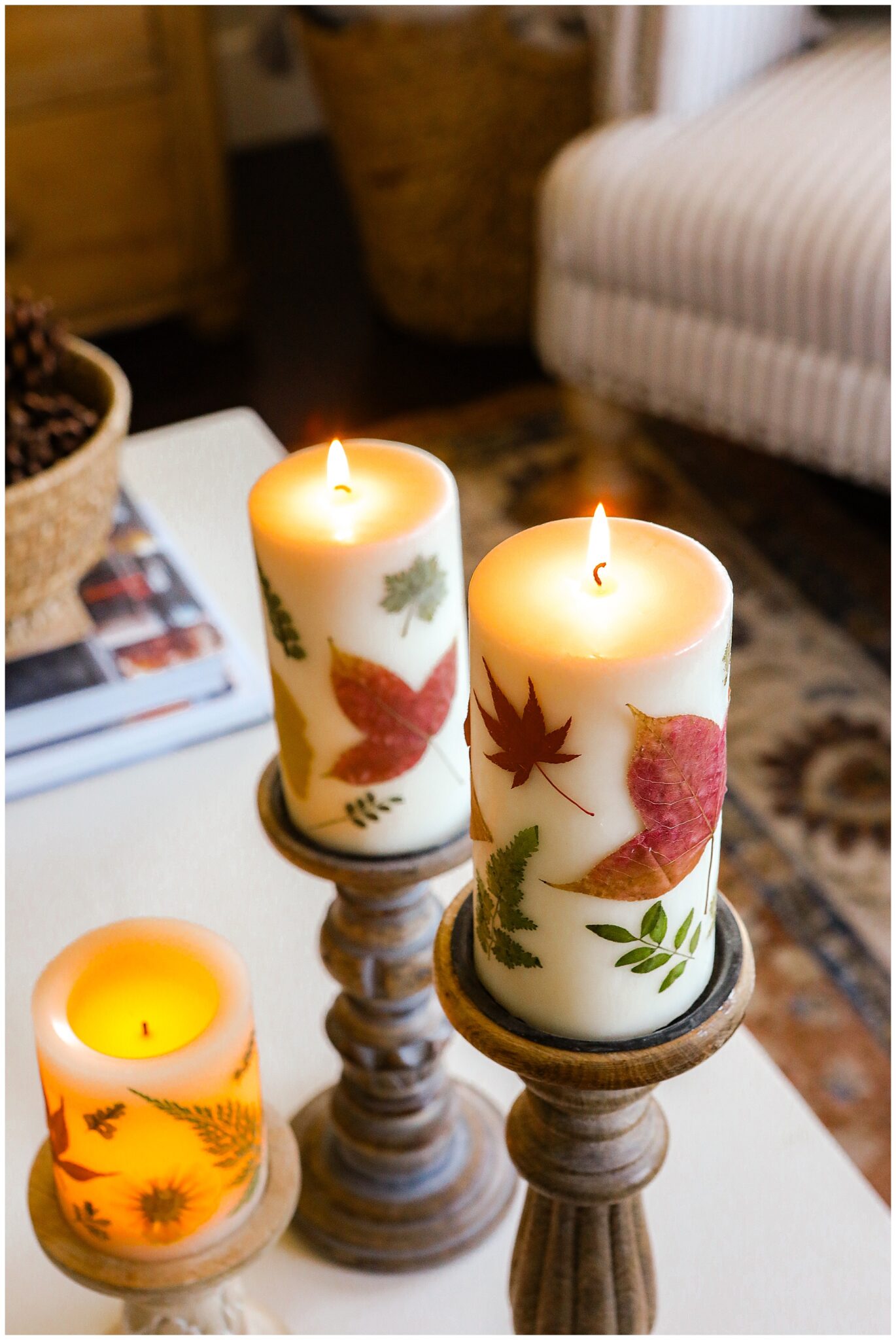 Fall craft ideas featuring botanical pillar candles with pressed flowers