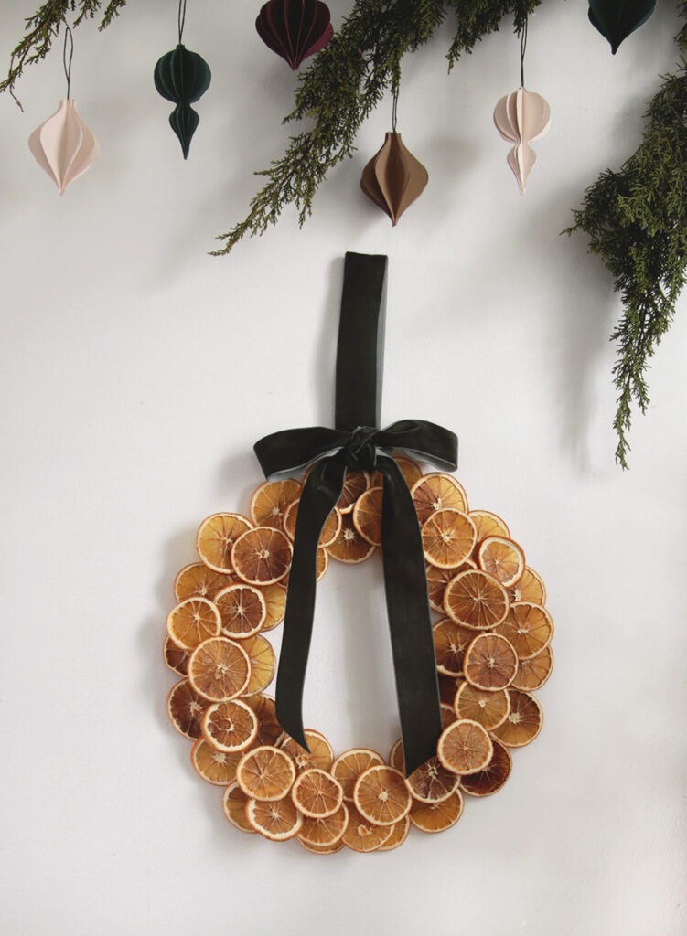Fall craft ideas featuring a dried orange wreath